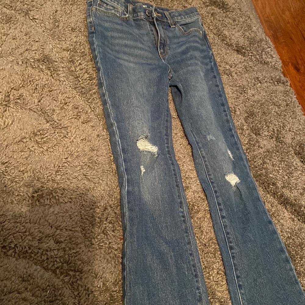 Ripped blue jeans